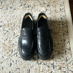 Black leather loafers